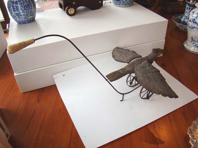 A late Victorian carved wooden spread wing eagle push toy — image 2